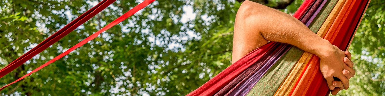 student relaxing in pop-up hammock student relaxing in pop-up hammock