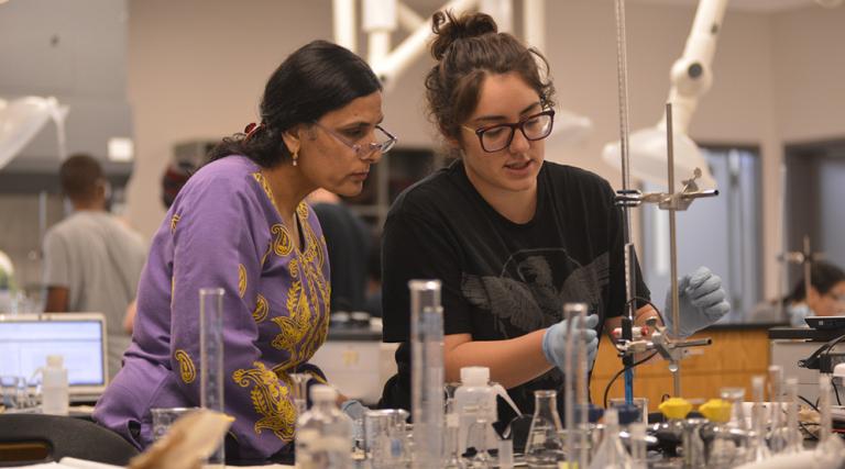 Faculty member and student in chemistry lab