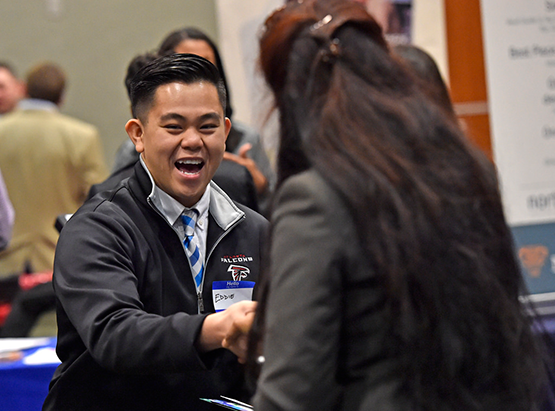 student meeting employer at GGC career fair