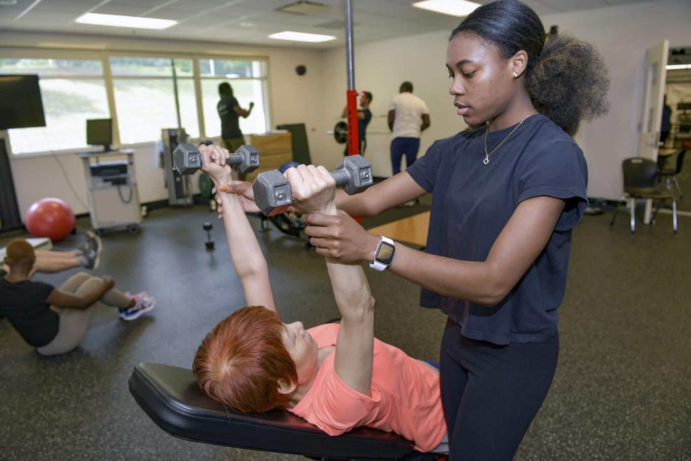 people working out in health screening lab