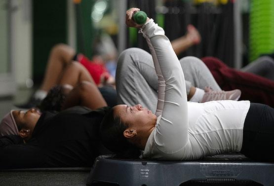 Jazmin Roberts performs a weight press