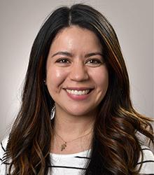 Diana Gonzalez smiling at the camera