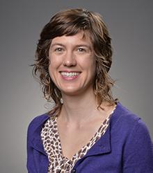 Catherine A. Moore smiling at camera