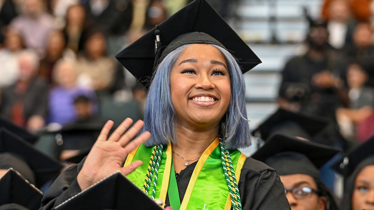 GGC grads at selfie station, 2024 Spring Commencement