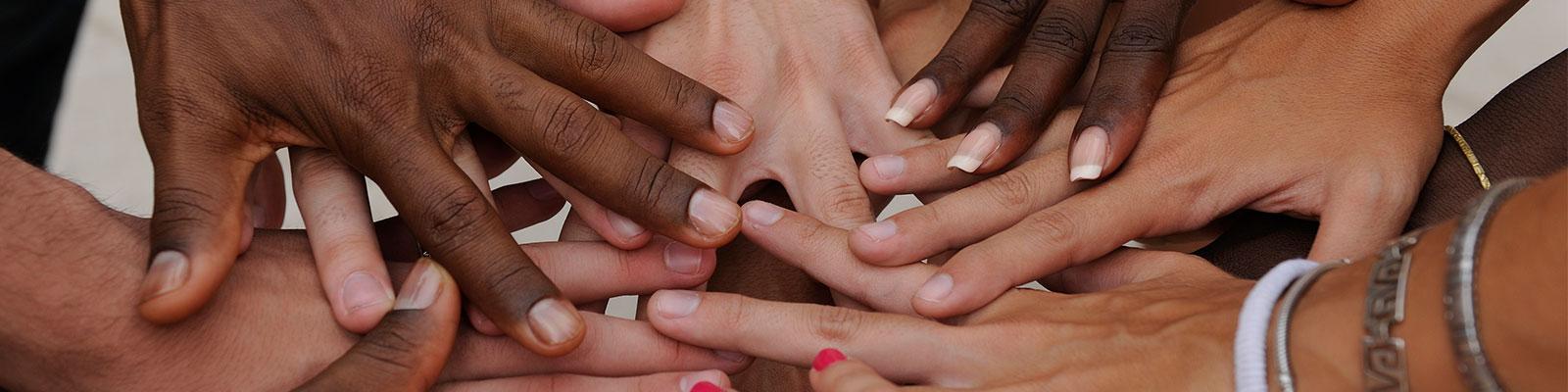 diverse student hands in center circle diverse student hands in center circle